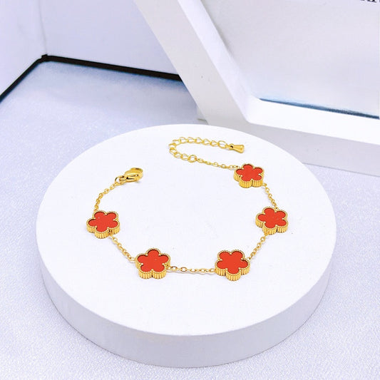 Цветни позлатени гривни с форма на цвете