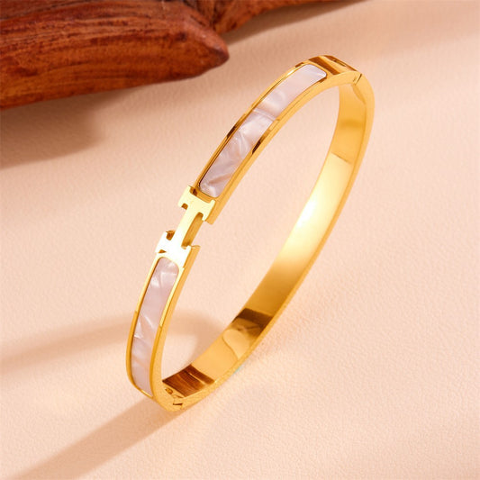 Гривна от неръждаема стомана с буквата H